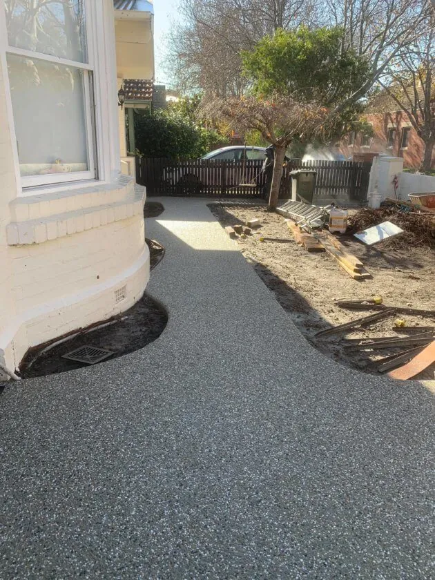 Garden Walkway - Stamped concrete garden walkway with decorative patterns for residential landscaping